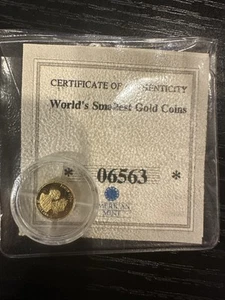 AMERICAN MINT - $25 - .999 GOLD WORLD'S SMALLEST COINS 2001 James Cook 6563 - Picture 1 of 3