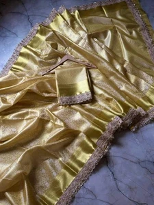 Golden glow banarasi soft tissue silk saree with intricate embroidered lace - Picture 1 of 6