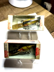 2 Heddon Deep 6's L vintage entrambi nuovi con scatola - Foto 1 di 2