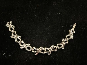 KRONE TRIFARI SILBERFARBEN 7 SCHLEIFEN 7" ARMBAND - Bild 1 von 1