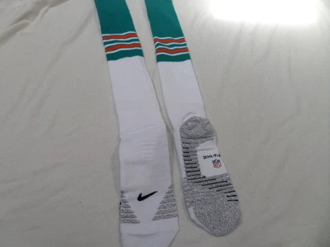 MIami Dolphins official  uniform socks.  Team issued Cover