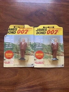 1965 GILBERT JAMES BOND SECRET AGENT 007 GOLDFINGER AND MONEYPENNY LOT OF 2 - Picture 1 of 4