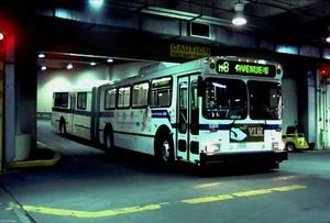 5x7 COLOR PHOTO NYC BUS 1999 NF ARTIC #5302 INSIDE WESTSIDE DEPOT APRIL 1, 2000 - Picture 1 of 1