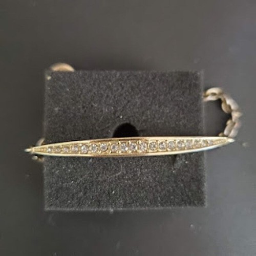 Bracciale Michael Kors Pave Bar tono oro con chiusura aragosta