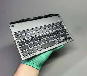 Small Bluetooth Keyboard for iPad iPhone Samsung Ultra Thin Portable Foldable - Photo 1/22