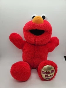 Muñeca de peluche parlante Sesame Street TICKLE ME ELMO SORPRESA 13" - Imagen 1 de 8