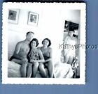 FOUND B&W PHOTO N_0766 SHIRTLESS MAN SITTING WITH PRETTY WOMEN IN SWMSUITS
