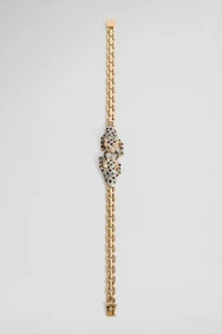 Vintage elegant thin cheetah 14k gold bracelet with set rubies - Foto 1 di 3