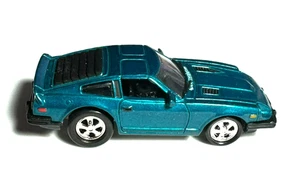 JOHNNY LIGHTNING 1999 PLAYING MANTIS BLUE DATSUN 280 Car SCALE 1:64 P-425 - Picture 1 of 6