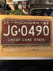 1969- Michigan Great Lake State License Plate. .# JG- 0490. road wear.