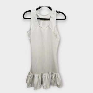 Vestido de tenis TAIL Coletta dobladillo con volantes espalda deportiva tiza poliéster spandex - Imagen 1 de 9