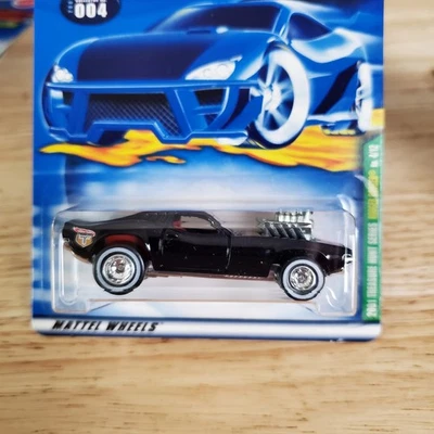 Hot Wheels 2001 Treasure Hunt Rodger Dodger, con cubierta protectora  Foto 1 de 3