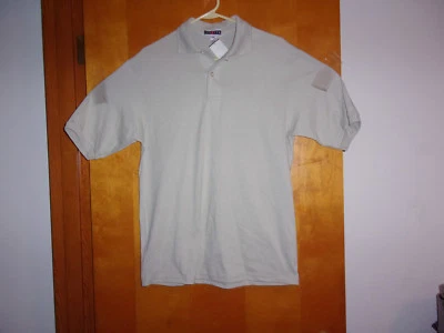 NUEVO POLO JERZEES HOMBRE GRIS MARFIL S/S 2 BOTONES...TALLA...MEDIANO... Foto 1 de 3