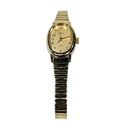 Reloj analógico de cuarzo Timex CR 1216 tono dorado celular para mujer Foto 1 de 4