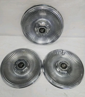 Juego de 3 tapacubos de acero inoxidable Pontiac Grand Prix 1980-81 14 pulgadas OEM GM Foto 1 de 4