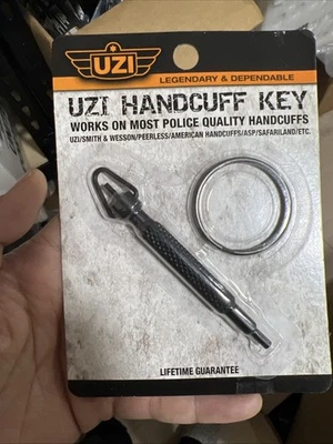 Llave esposada giratoria UZI con llaveros pequeños y grandes #UZI-KEY-ROTATE Foto 1 de 2