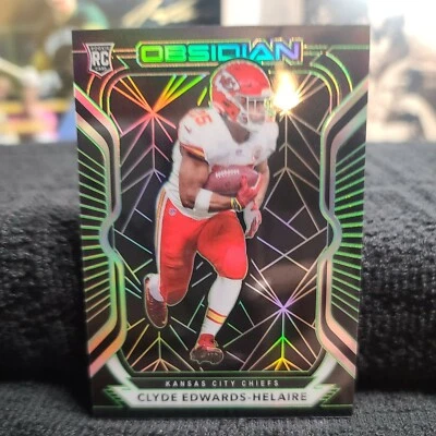 CLYDE EDWARDS-HELAIRE 2020 PANINI OBSIDIAN ELECTRIC ETCH ORANGE RC  30/50 SSP - Image 1 of 4