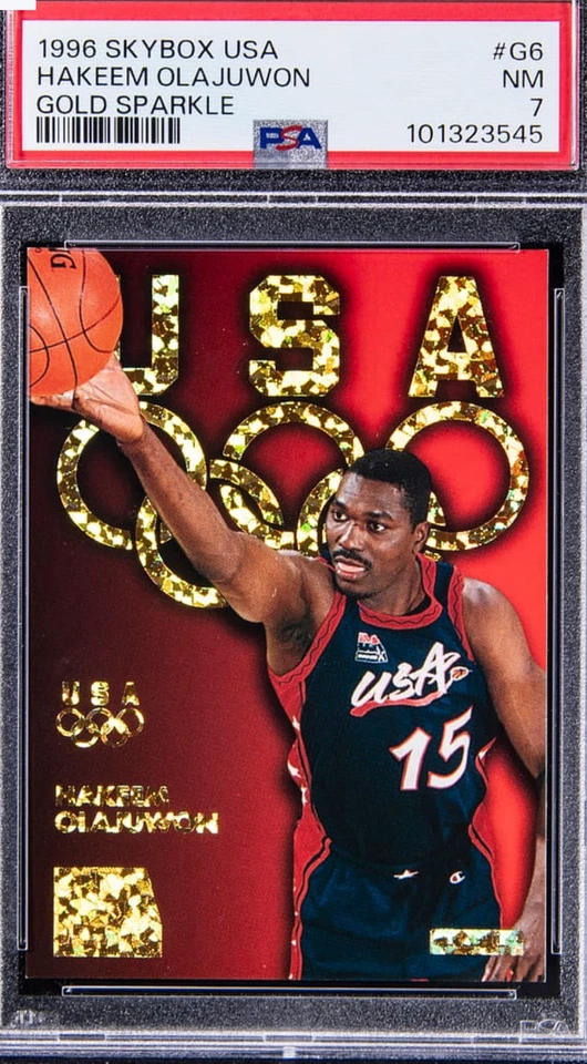 1996 SkyBox USA Gold Sparkle #G6 Hakeem Olajuwon PSA 7 Olympics Team USA - Image 1 of 2