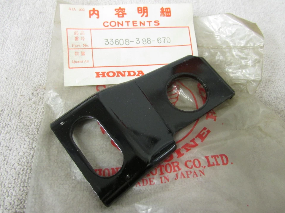 NOS 76-77 HONDA CJ360T CJ360 CJ 360 SOPORTE DE SUJECIÓN INTERMITENTE TRASERO DERECHO  Foto 1 de 2