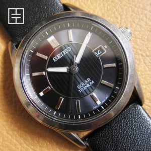 SEIKO V145-0AZ0 Men’s Solar Titanium Watch w/ Black Dial - Picture 1 of 8