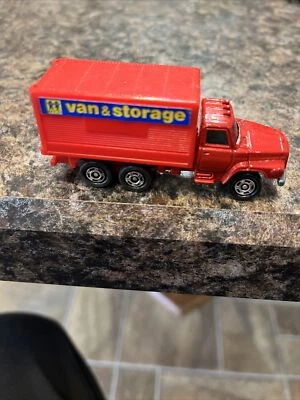 TOMICA Nº16 = FURGONETA Y CAMIÓN DE ALMACENAMIENTO NISSAN DIÉSEL = ROJO Foto 1 de 4