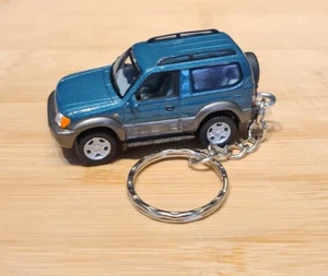 1/72 DIECAST MODEL CAR TOYOTA LAND CRUISER KEYCHAIN KEYRING  - Picture 1 of 4