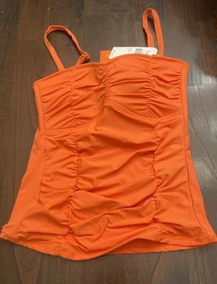 Bandkini Leilani naranja junto a la piscina talla 6 343 Foto 1 de 4