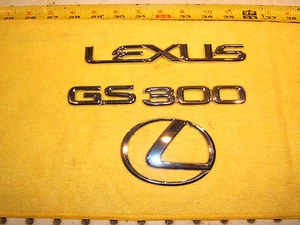 Lexus 1999 GS300 sedan Rear deck lid CHROME plastic OEM 3 Emblems, NOT GOLD - Picture 1 of 12