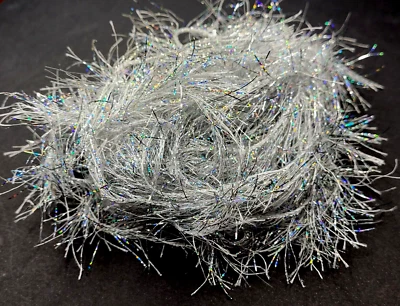 CRISTAL HIELO HACKLE - PERLA PLATEADA - 5 yardas - reemplazo de pluma - material para atar moscas Foto 1 de 4
