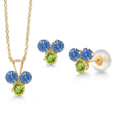 Juego de aretes colgantes de 3 piedras y circonitas azules de lujo de oro amarillo de 14K Foto 1 de 3