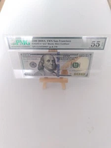 PMG About Uncirculated 55 EPQ Fr. 2187-L* 2009A $100 Federal Reserve Star Note - Picture 1 of 4