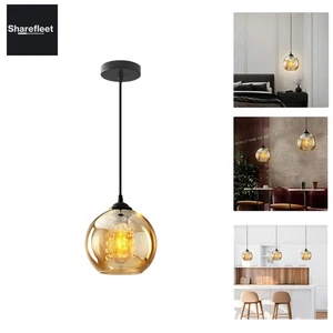 Elegante Kristall Pendelleuchte in Amber für eine romantische Atmosphäre - Bild 1 von 12
