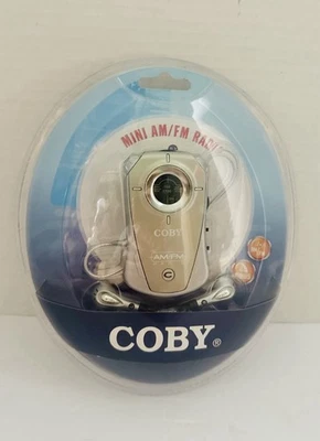 Coby Mini AM/FM Radio CX-71 With Earbuds In Silver NIB 8.25x7x1.5” Made In China - Image 1 of 4