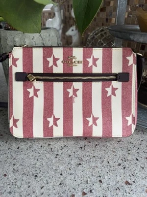 Bandolera de cuero Coach estrellas rojas y blancas Foto 1 de 4