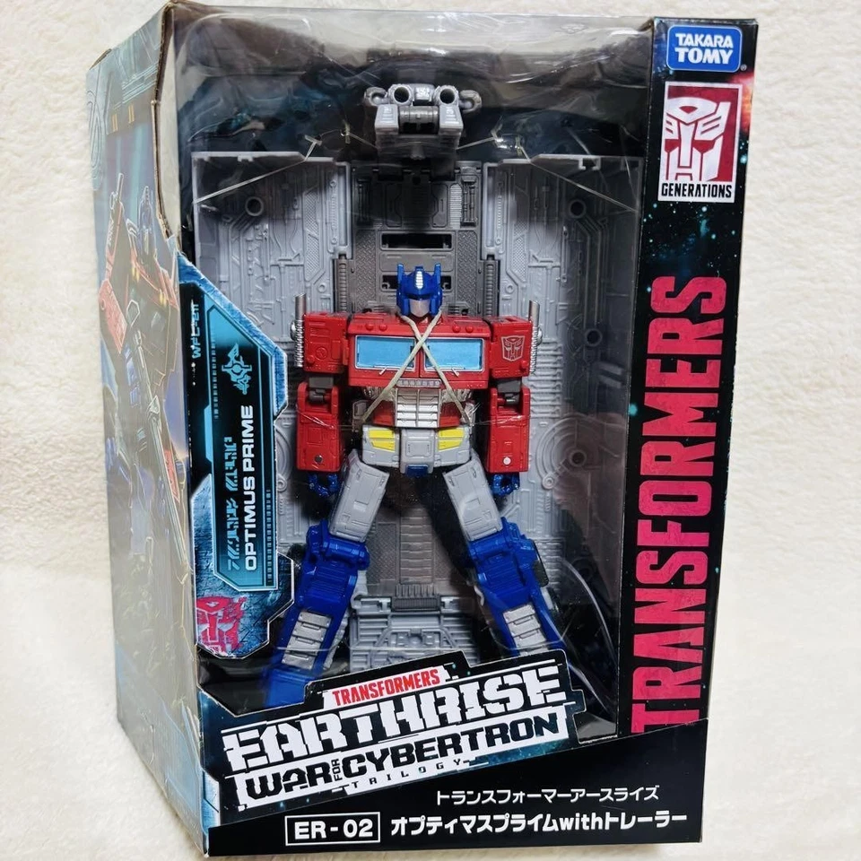 Takara Tomy Transformers Earthrise ER-02 Optimus Prime con rimorchio mai aperto - Immagine 1 di 4