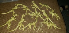 Lot of 11 Dinosaur Toy Skeletons KO China Jurassic Park Dino Rider Raptor Fossil
