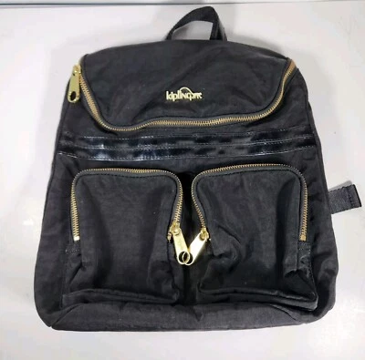 MOCHILA KIPLING SHAKI NEGRA Y DORADA  Foto 1 de 4