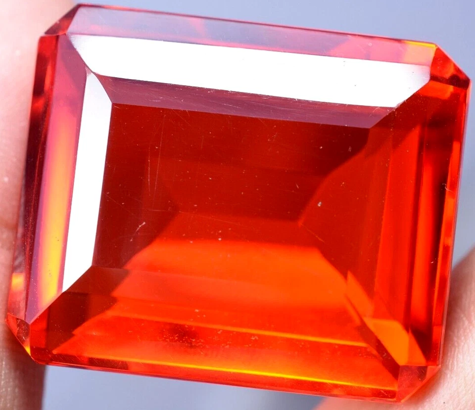 Lab created 128.05 Ct Splendid Orange Topaz GGL Certified Emerald Cut Gemstone Foto 1 de 4