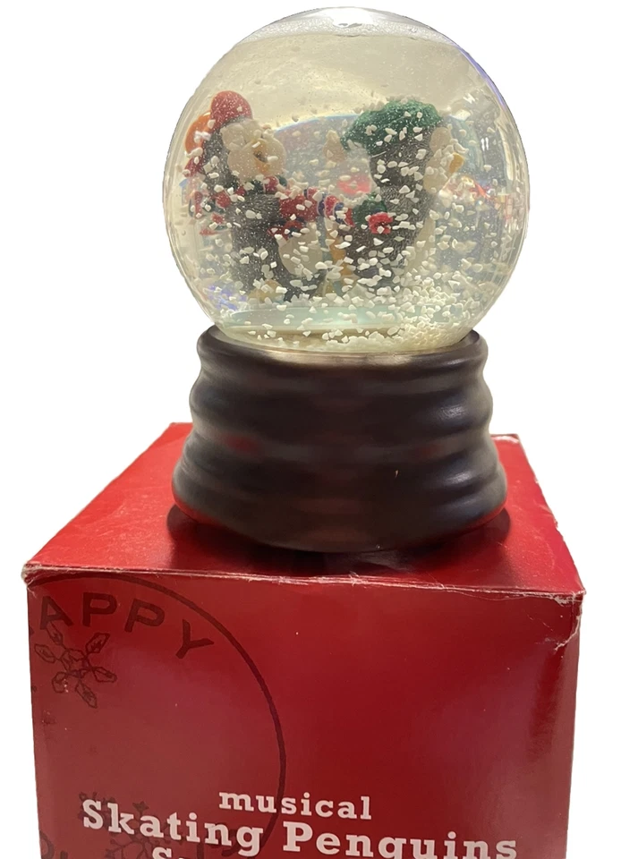 MUSICAL PATINAJE PINGÜINOS GLOBO DE NIEVE/JUEGOS”LET IT SNOW” Foto 1 de 4
