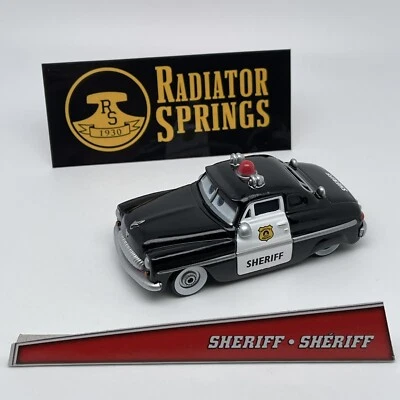 MATTEL VOITURE DISNEY PIXAR CARS Radiator Springs - Sheriff / Sherif + Bumper Sticker