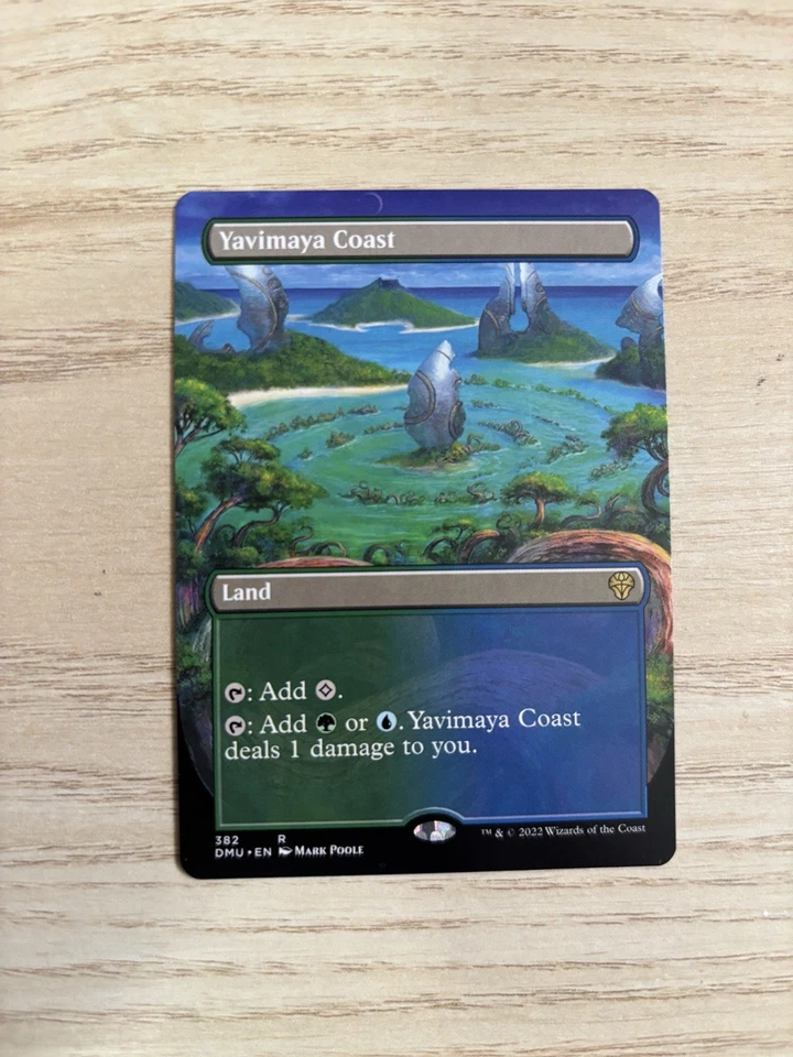 BORDERLESS Yavimaya Coast Dominaria United - DMU 382 - MTG Magic Card English NM - Image 1 of 1
