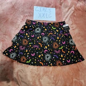 New Girls XXL Candy Corn Spider Webs Bats Stars Halloween Black Tiered Skirt NWT - Picture 1 of 5