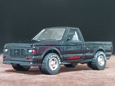 JOHNNY LIGHTNING (circa 1/64) 1991 GMC Cyclone (nero) / leggermente necessari... - Immagine 1 di 4