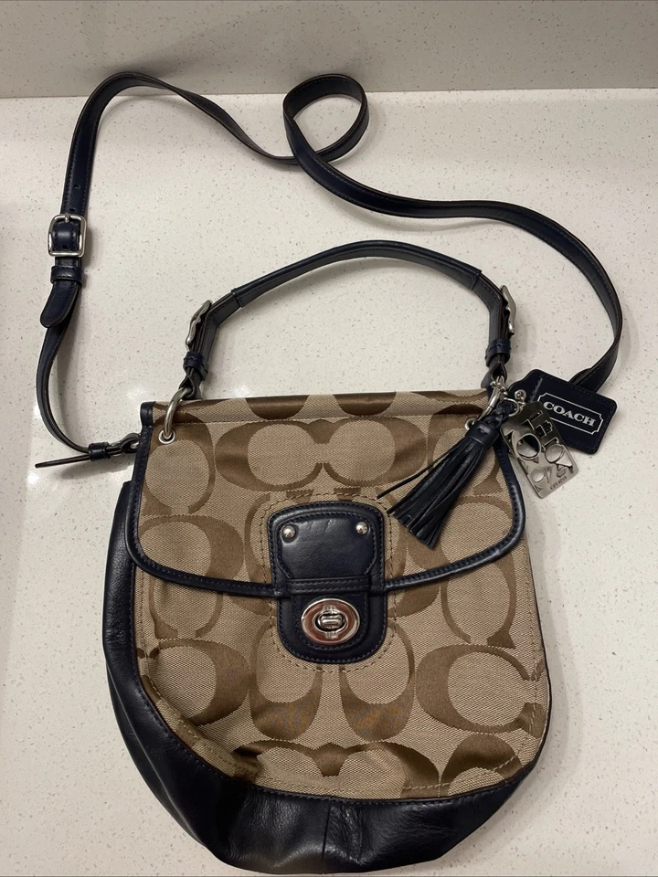 Bolso Bandolera Coach Willis Signature Legacy Azul Marino Cuero Logo Bloqueo Giratorio Foto 1 de 4