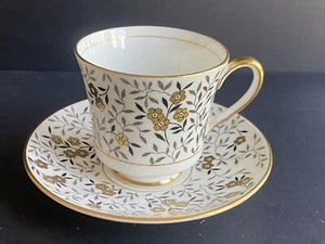 Juego de platillo de taza de té Coalport Bone China flor dorada y hojas negras - Imagen 1 de 8