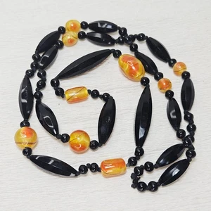 Collana ATQ insolita veneziana o ceca giallo satinato nero vetro sfaccettato annodato - Foto 1 di 10