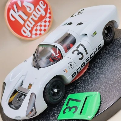 Exoto 1/18 Porsche 910 #37 White Green 12h Sebring Siffert Herrmann MTB00062 - Image 1 of 4