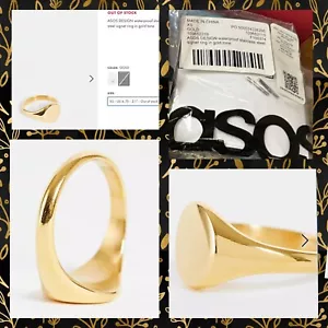 Anillo de oro con diseño XS de ASOS anillo de sello de acero inoxidable en tono dorado inicial en blanco - Imagen 1 de 9