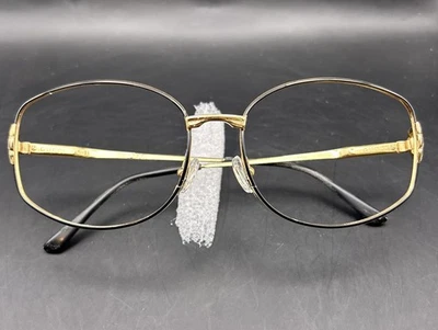 Marco óptico de gafas Gucci vintage negro/dorado 58-17-135 Foto 1 de 4