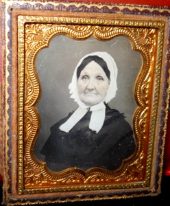 1/9th size Daguerreotype of lady in a half case